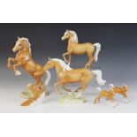 A Beswick Galloping Horse, model No. 1374 in palomino, 18.5cm high, Welsh Cob Rearing, model No.