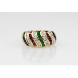 A sapphire, ruby, emerald and diamond 18ct gold bombe ring, designed as alternating waved bands of