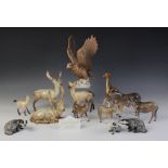 A Beswick Deer family, comprising: Stag Standing, model No. 981, Stag Lying, model No. 954, Doe,