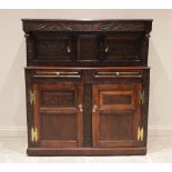 An early 18th century and later constructed Welsh oak court cupboard, Cwpwrdd Deuddarn, dated