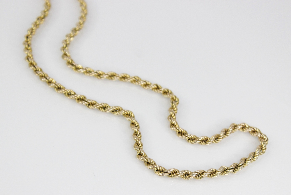 A gold coloured rope twist chain, jump ring with 9ct gold import marks for London 1979, 61.5cm long, - Image 3 of 4