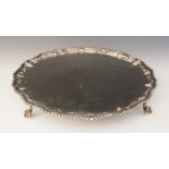 A George III silver salver, Richard Rugg I, London 1768, the circular salver with gadrooned and cast