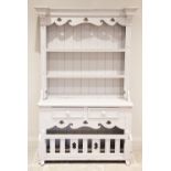 A Victorian style painted pine dresser, 20th century, the moulded dentil cornice above a shaped