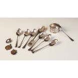 A selection of silver tableware and accessories, to include four George V silver teaspoons,