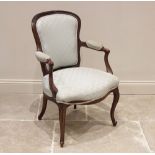 A Louis XV walnut fauteuil, late 19th/early 20th century, the padded back rest extending to out