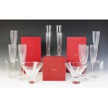 An assorted collection of stem glasses, comprising eight red wine glasses, eight martini glasses,