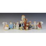 Ten Beatrix Potter figures, comprising: Tom Kitten (first version: small size; first variation: deep