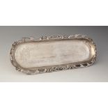 An Edwardian silver pin tray, Levi & Salaman, Birmingham 1906, the lozenge form tray with pierced