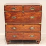 A 19th century mahogany two section campaign chest of drawers, formed from two short over one long