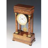 A late 19th century Austrian rosewood and marquetry portico clock, the suspended 10cm white
