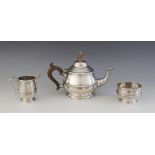 A George V silver bachelor's tea service, Goldsmiths & Silversmiths Co Ltd, London 1922, each