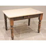 A 19th century pine country kitchen table, the rectangular scrub top with rounded corners above a