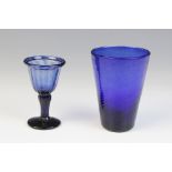 A Bristol blue glass beaker, the wrythen body of tapering form, unpolished pontil, 10cm high, with a