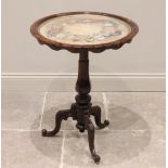 A mid 19th century glazed rosewood pedestal table, the circular top inset with a foliate