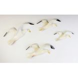 A set of four Beswick graduated seagull wall plaques, numbers 658-1, 658-2, 658-3 and 658-4, the