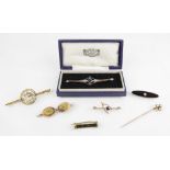 A selection of Victorian and later brooches and stick pins, to include an early 20th century diamond