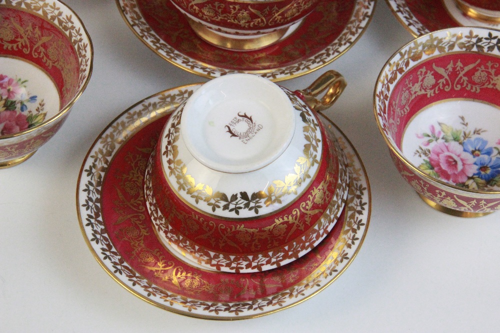 A Collingwoods part tea service, comprising: a teapot and cover, a milk jug, a sugar bowl, sixteen - Image 2 of 3