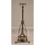A late 19th/early 20th century brass and copper Art Nouveau telescopic standard lamp, the central