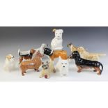 A collection of Beswick dogs, to include a seated bulldog, model No. 1872, 12.2cm high, a boxer