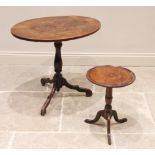 A George III fruitwood tripod table, the oval top with moulded detail to the edge, raised upon a