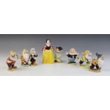 A Beswick Snow White & The Seven Dwarves set, comprising a model No. 1332B Snow White, a model No.