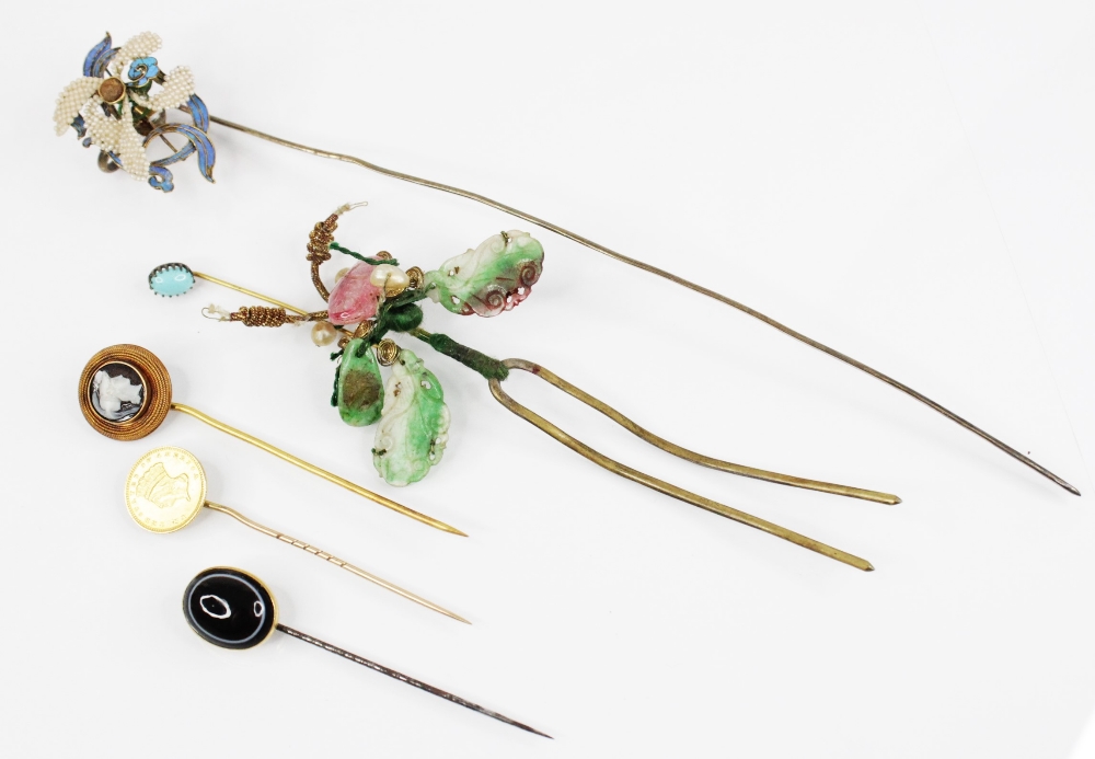 A selection of stick pins and accessories, to include a carved hardstone cameo stick pin,