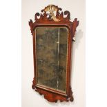 A George III style mahogany fretwork wall mirror, late 19th/early 20th century, with an openwork