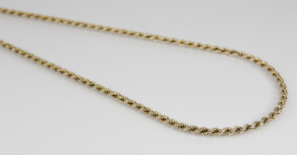A gold coloured rope twist chain, jump ring with 9ct gold import marks for London 1979, 61.5cm long, - Image 2 of 4