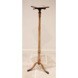 A Victorian mahogany torchere / coat stand, the turned cylindrical column extending to three down