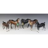 A Beswick "Black Beauty", model No. 2466, in matt black, 18cm high, with a Swish Tail Horse, model