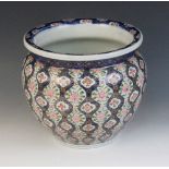 A Japanese Imari porcelain jardinière, 20th century, of circular form, externally decorated with