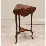 A Victorian rosewood triangular drop leaf occasional table, the segmentally veneered top above the