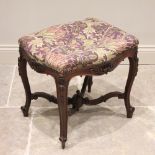 A Louis XV style carved walnut dressing stool, later upholstered in William Morris artichoke fabric,
