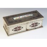 A faux ivory and boulle work casket, with hinged cover and split hinged front panel opening to a