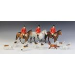 A selection of Beswick hunting models comprising; model No. 1501 huntsman on grey horse (