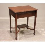 An Edwardian mahogany folding writing table, the rectangular top hinged to reveal a