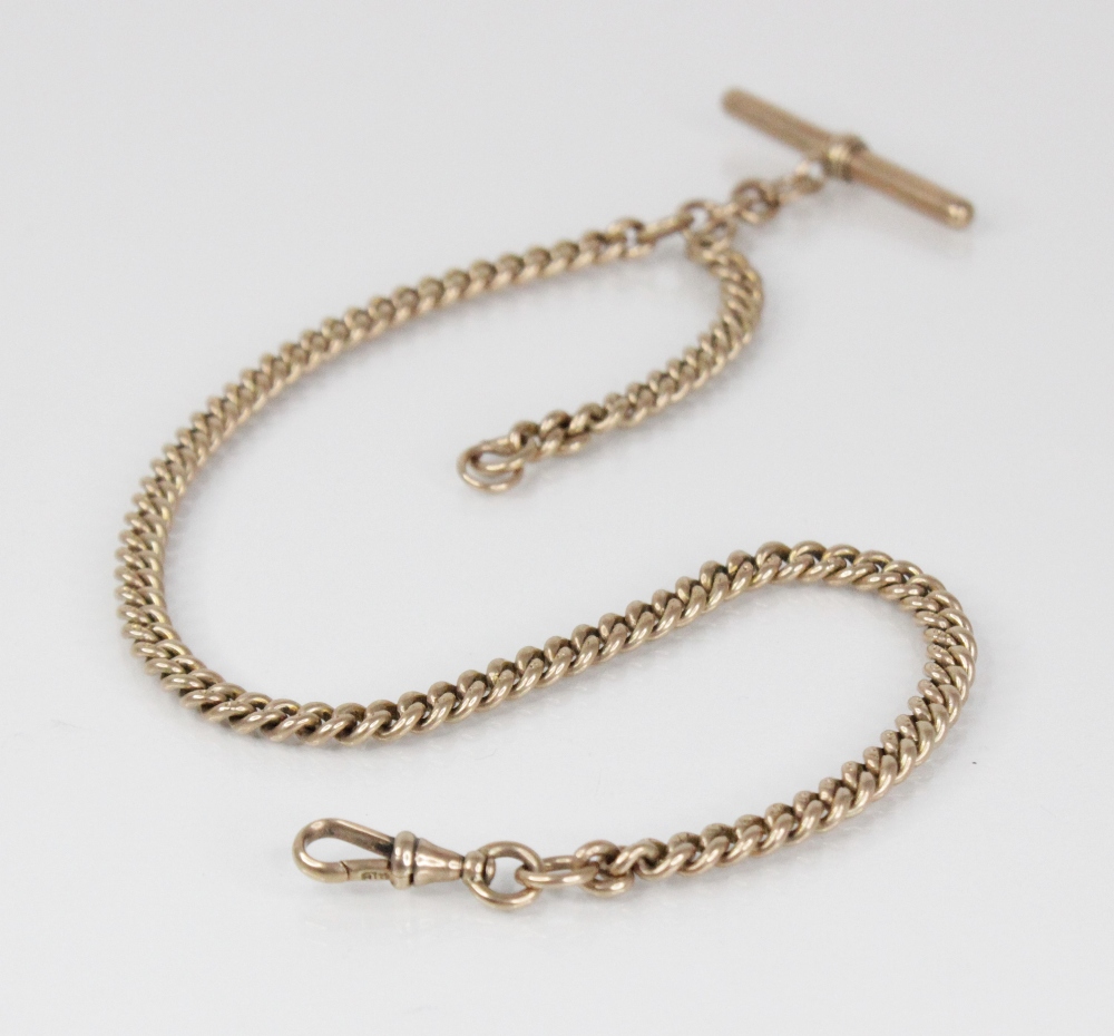 A Victorian gold coloured watch chain, designed as a graduated curb link chain with lobster claw
