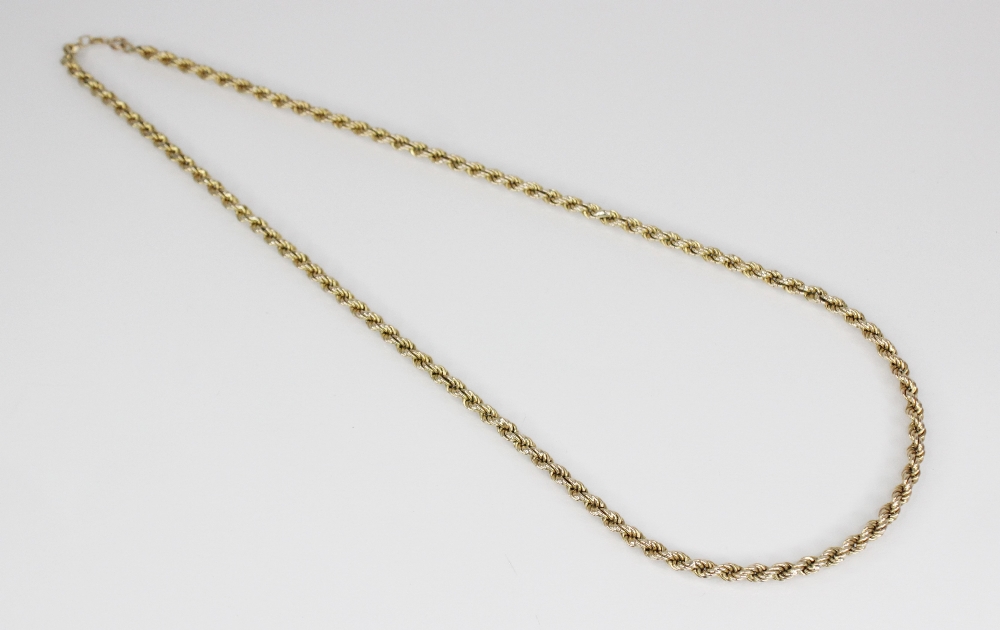 A gold coloured rope twist chain, jump ring with 9ct gold import marks for London 1979, 61.5cm long,
