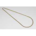 A gold coloured rope twist chain, jump ring with 9ct gold import marks for London 1979, 61.5cm long,