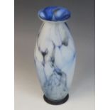 An Art Nouveau blue marbled glass vase, late 19th century, of tapering ovoid form with flared rim