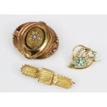 A Victorian pearl and turquoise set brooch, designed as a gold coloured heart with flower and