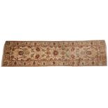A foliate pattern wool pile runner, the dijon coloured ground overlaid with trailing foliage in