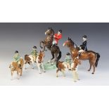A Beswick huntswoman on brown horse, model No. 1730 (style two), discontinued 1975, 21.5cm high,