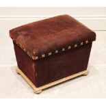 A Victorian velour upholstered giltwood cellarette, of box form with hinged cover enclosing a liner,