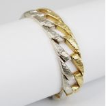 A continental bi-colour curb-link bracelet, in white gold and yellow gold hues with textured finish,