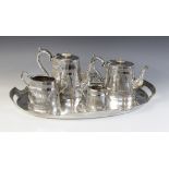 An Aesthetic Movement silver plated tray by Silber & Fleming, of oval form, shaped border with