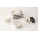 An Indian silver coloured niello jewellery box, of compressed square form on four bracket feet,