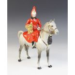 A Beswick Connoisseur model of a mounted Lifeguard, model No. 1624 style one (discontinued 1977),