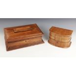 An early 20th century olive wood jewellery box, of sarcophagus form, opening to a later velour lined