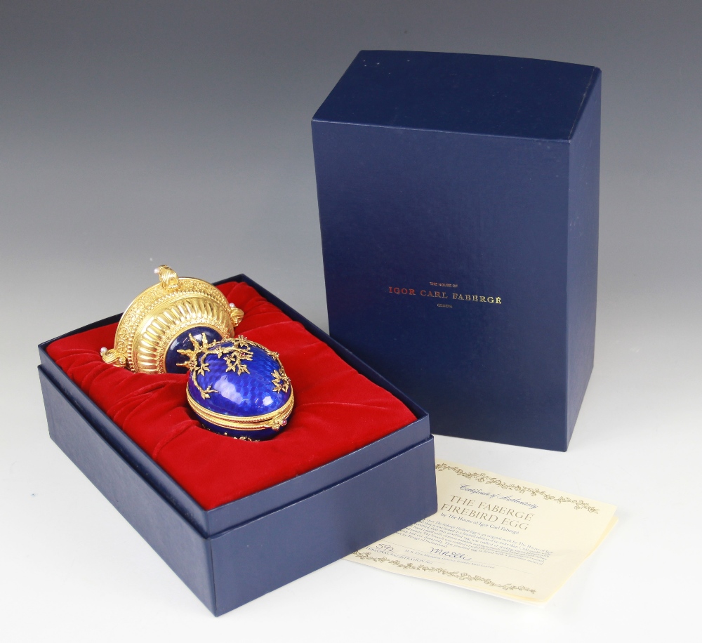 A Limited Edition musical 'Faberge Firebird Egg' by Franklin Mint, the silver gilt egg with blue - Image 11 of 12